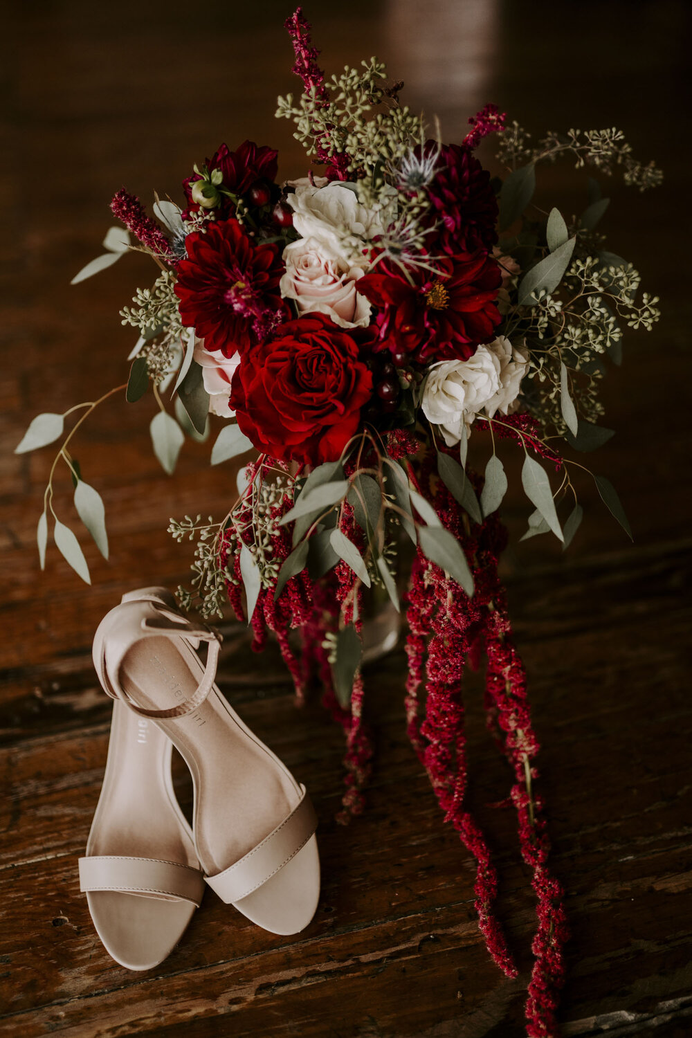 fall wedding day details, bride's floral bouquet and shoes