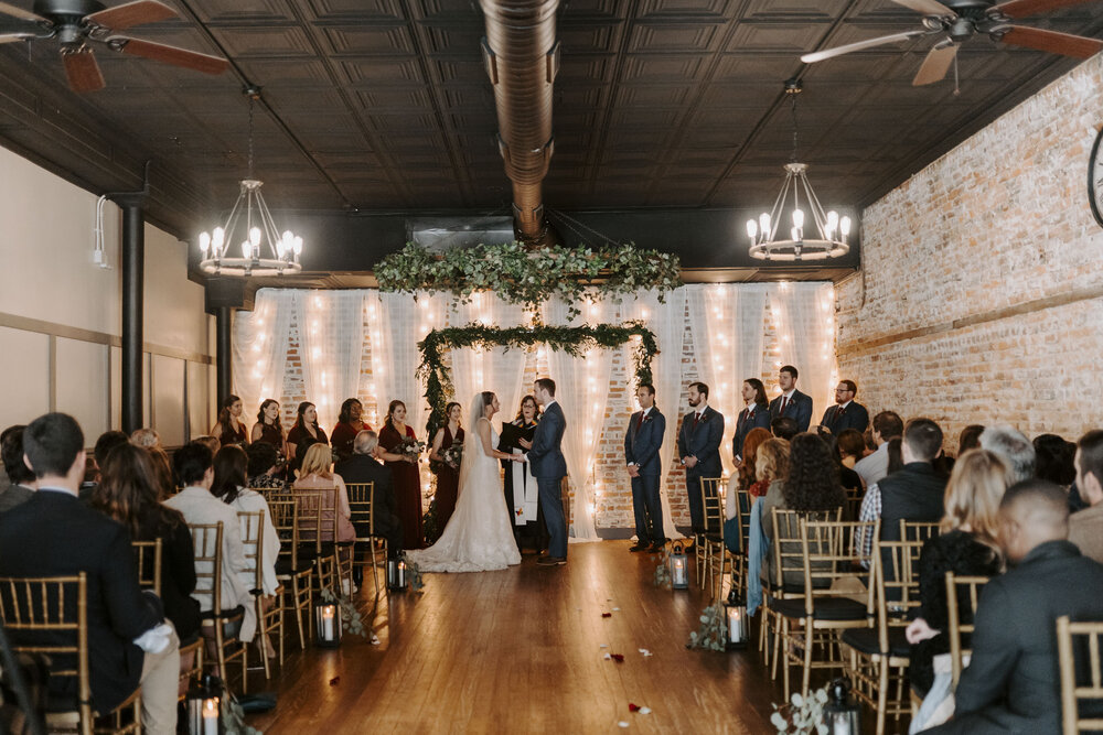 indoor fall wedding ceremony in winston-salem nc at rustic venue