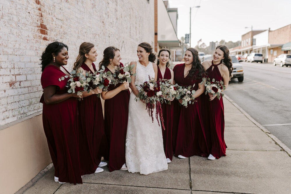 bridal party portraits in rustic downtown at fall wedding near Winston-Salem, NC