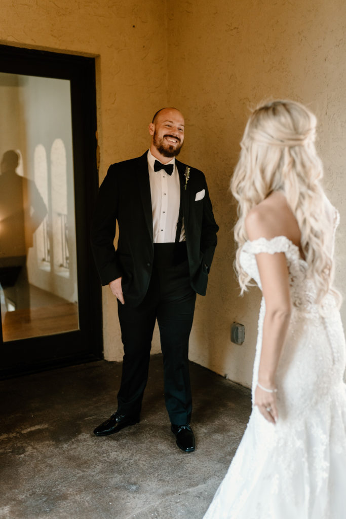 bride and groom's first look by Kayli LaFon Photography