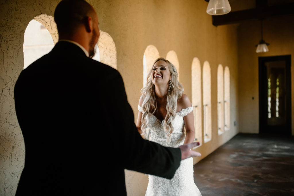 Happy bride and groom first look by Kayli LaFon Photography