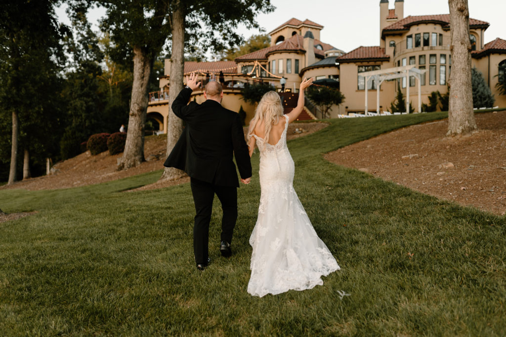 Bride and groom return to their wedding reception | Kayli LaFon Photography