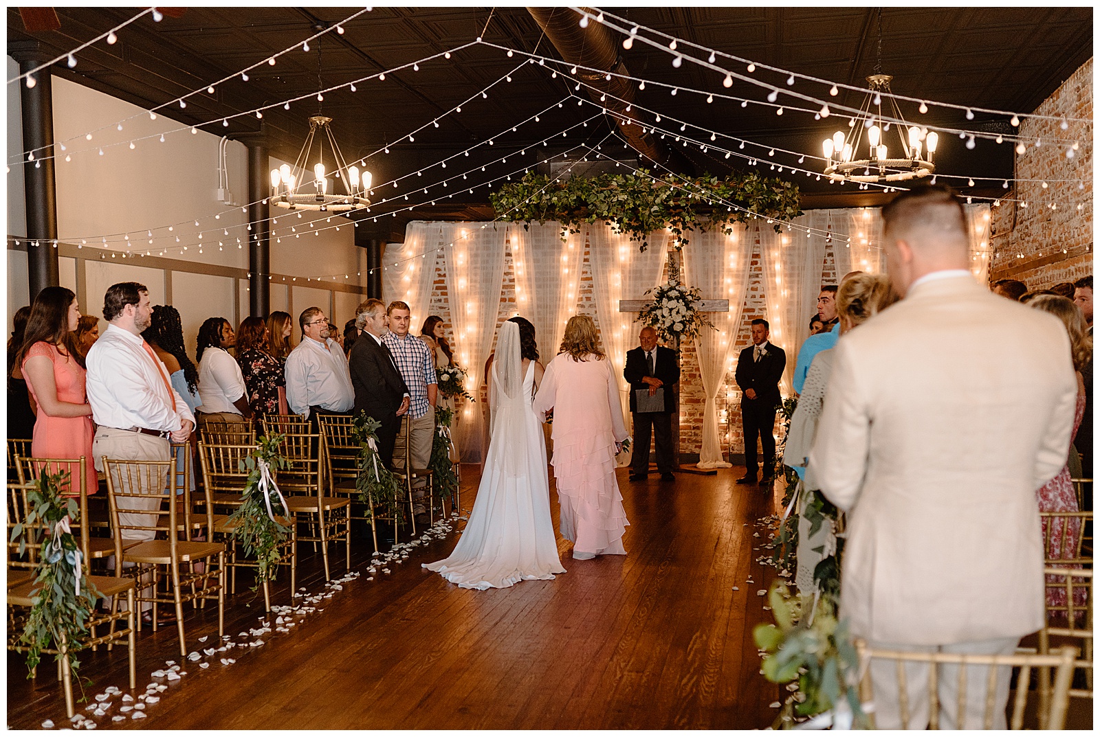 Bakery 1818 rustic modern ceremony site with twinkling lights