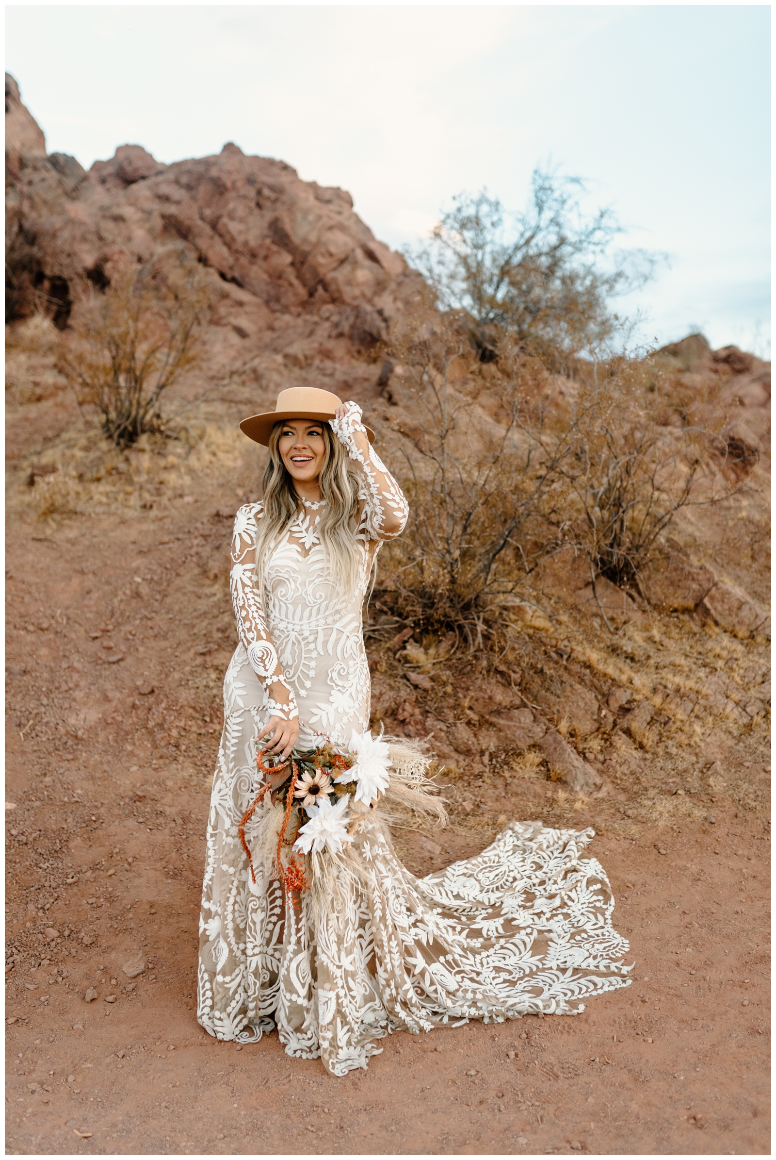 Gorgeous boho bride with Gigi Pip hat at Phoenix, Arizona park by destination elopement photographer
