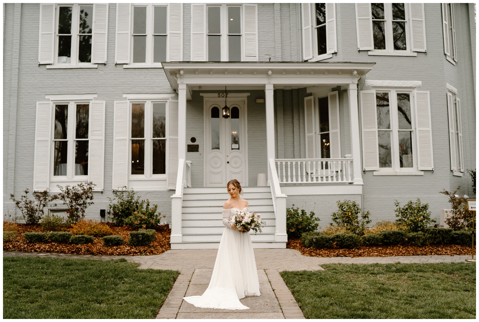Romantic bride in front of the McAlister-Leftwich house on her wedding day by Greensboro, Raleigh, and Charlotte photographer
