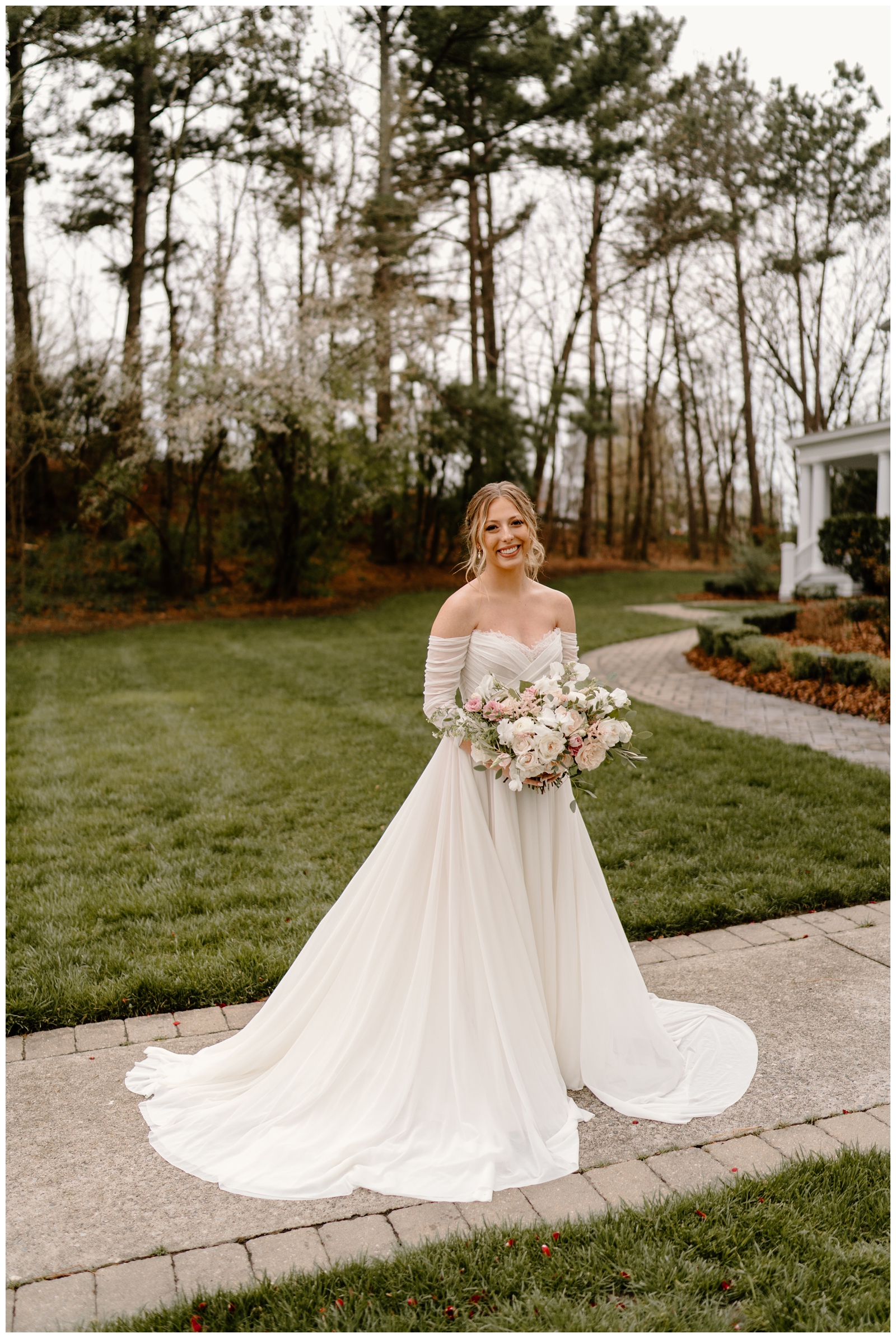 Romantic bridal portraits at the McAlister-Leftwich with her white, blush, and greenery bouquet by Greensboro, Raleigh, and Charlotte photographer