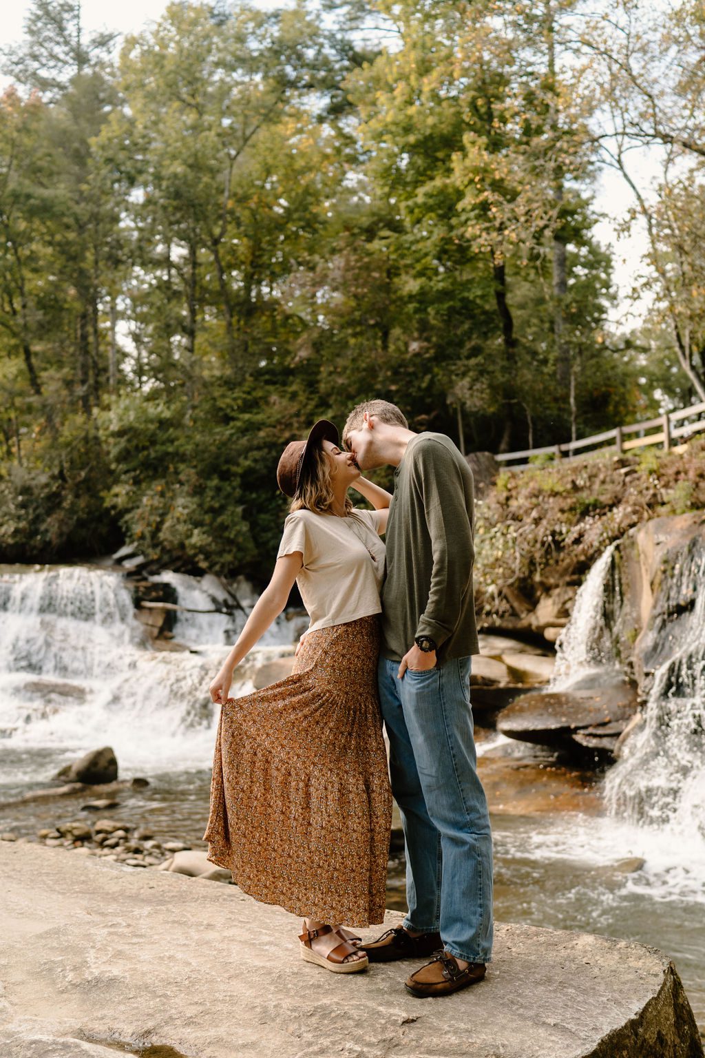 Couples Photos with waterfall and mountains backdrop in North Carolina