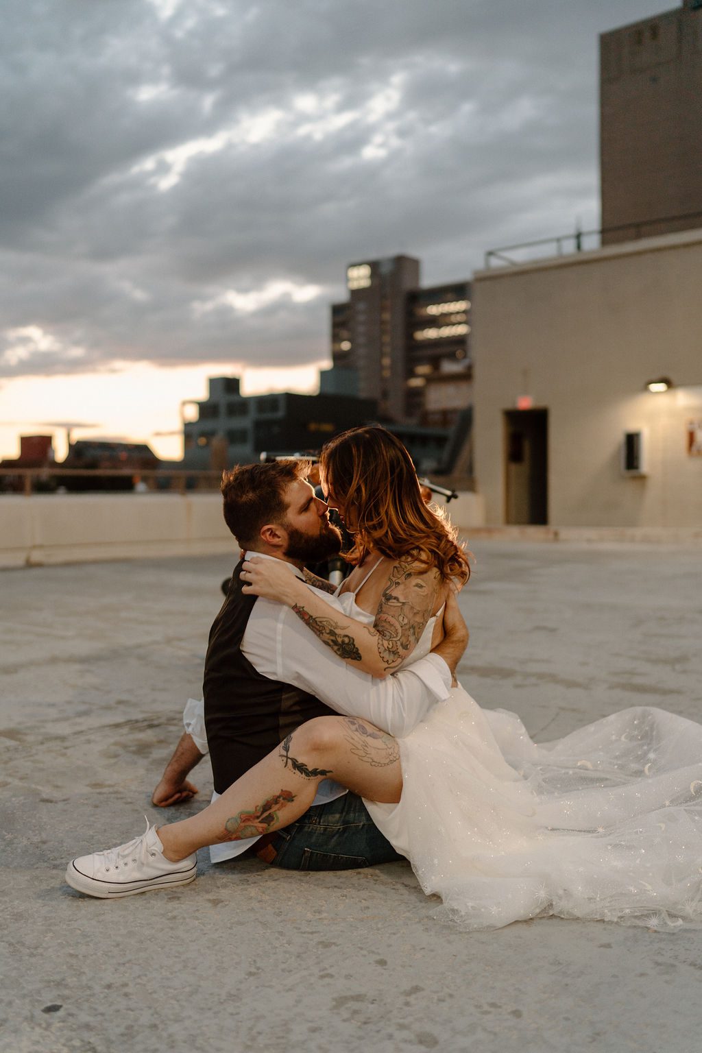 fun urban city elopement With Motorcycle on rooftop
