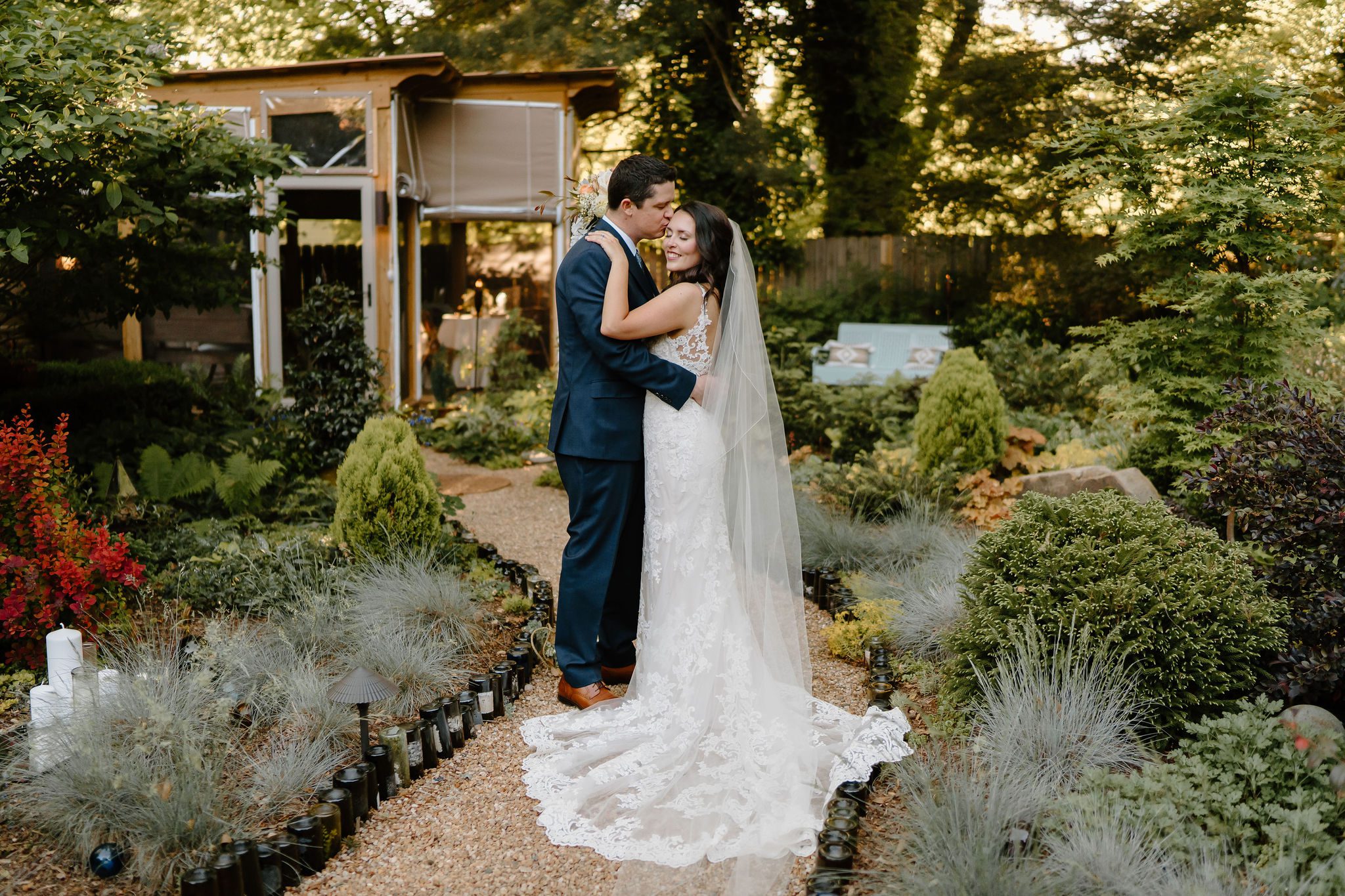 Greensboro bridal photos with gorgeous bride and groom in an intimate outdoor garden wedding setting