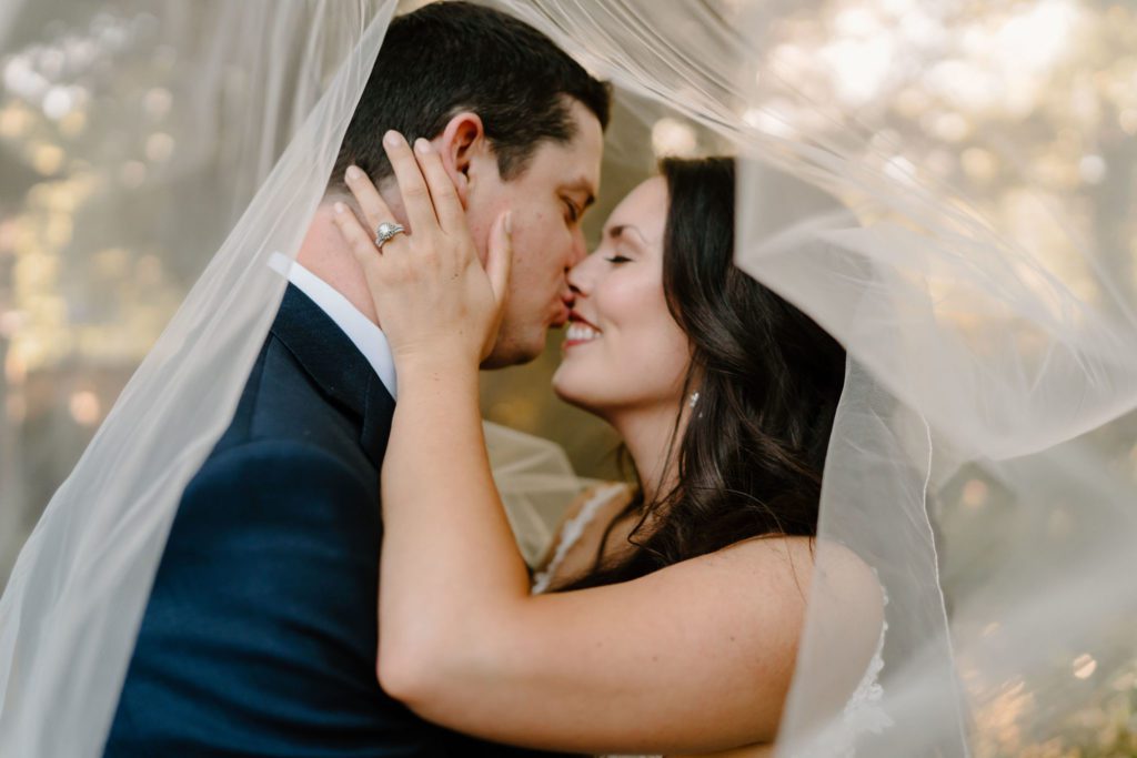 Greensboro bridal photos with gorgeous bride and groom in an intimate outdoor garden wedding setting