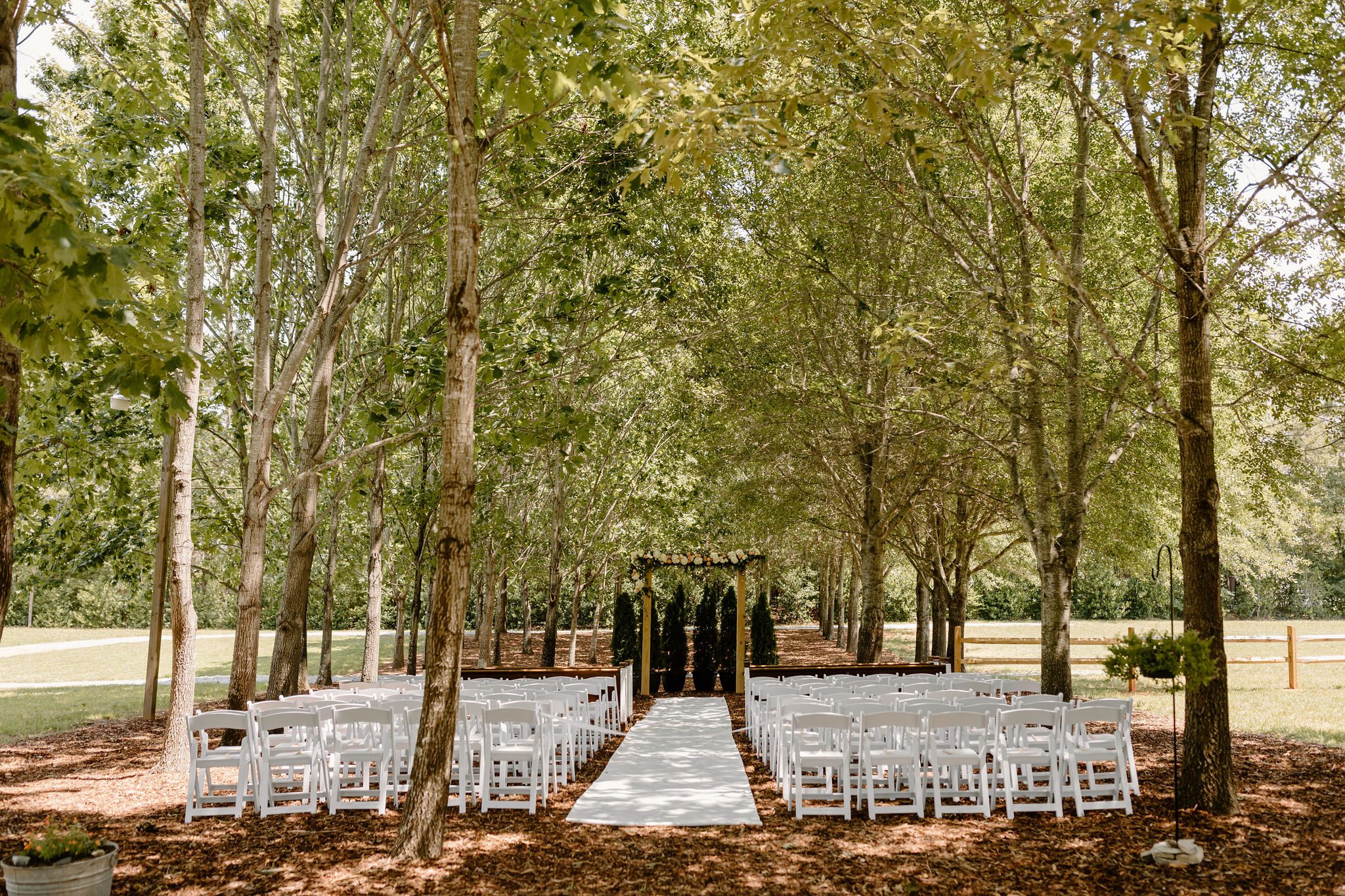 Long Acres Barn venue in Winston-Salem, North Carolina with beautiful decor and forest vibes
