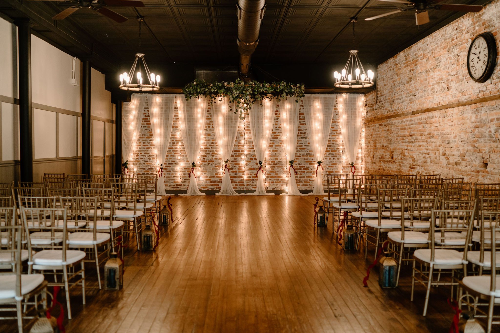 Details of Bakery 1818 venue in North Carolina during Christmas themed bride and groom photos with bridal party and friends and family
