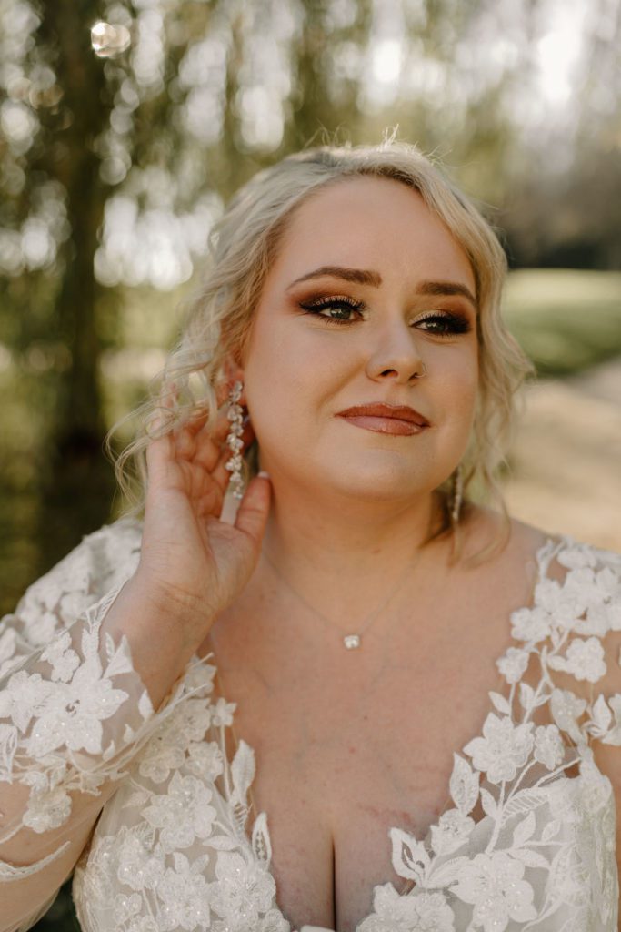 Bride poing for bridal portraits in Clemmons North Carolina