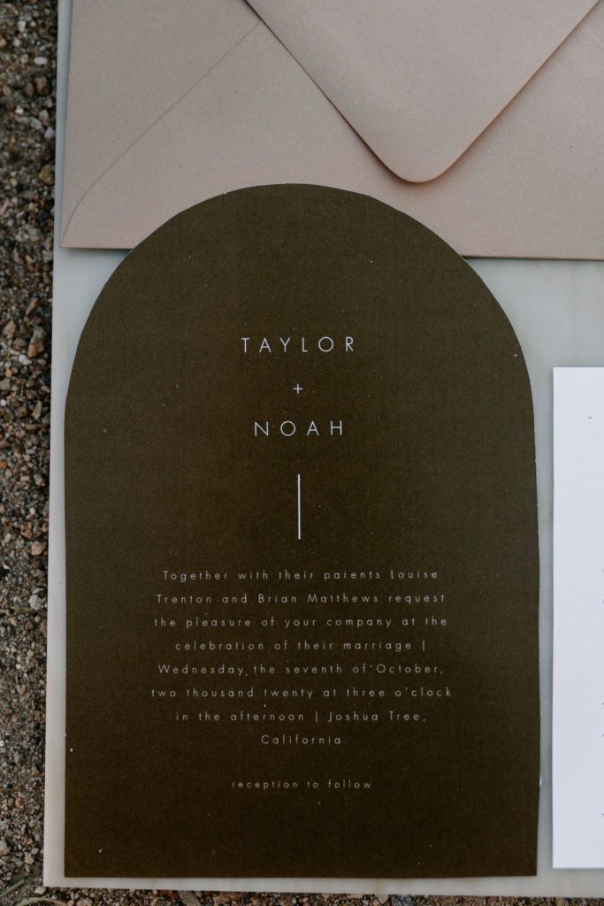 Wedding invites that say taylor + noah