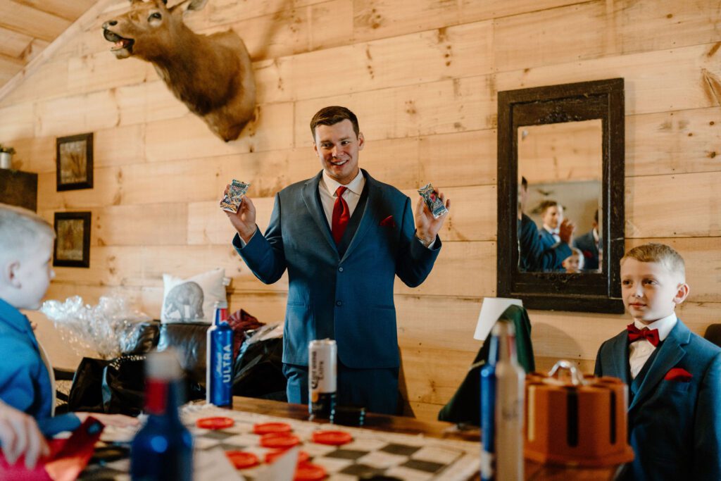 Groom and groomsman playing games before ceremony
