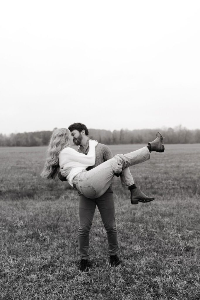 Couple posing for engagement photos in Winston-Salem, North Carolina