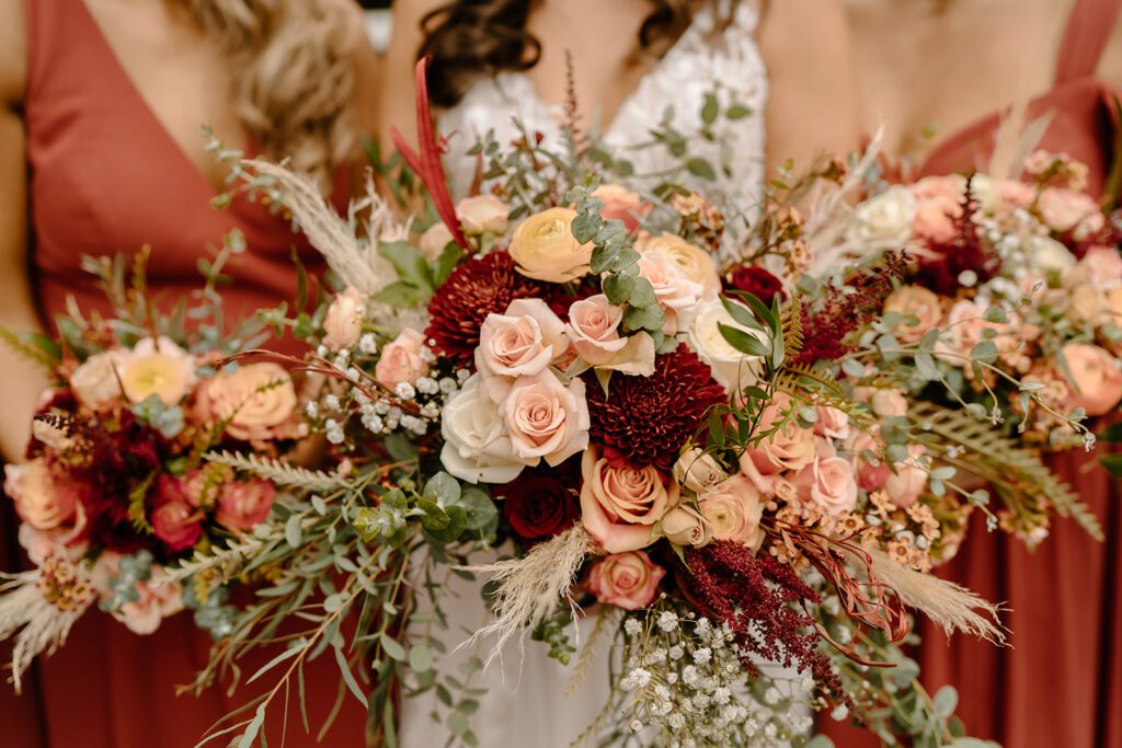 Bride and bridesmaids bouquets by Youngs Florist